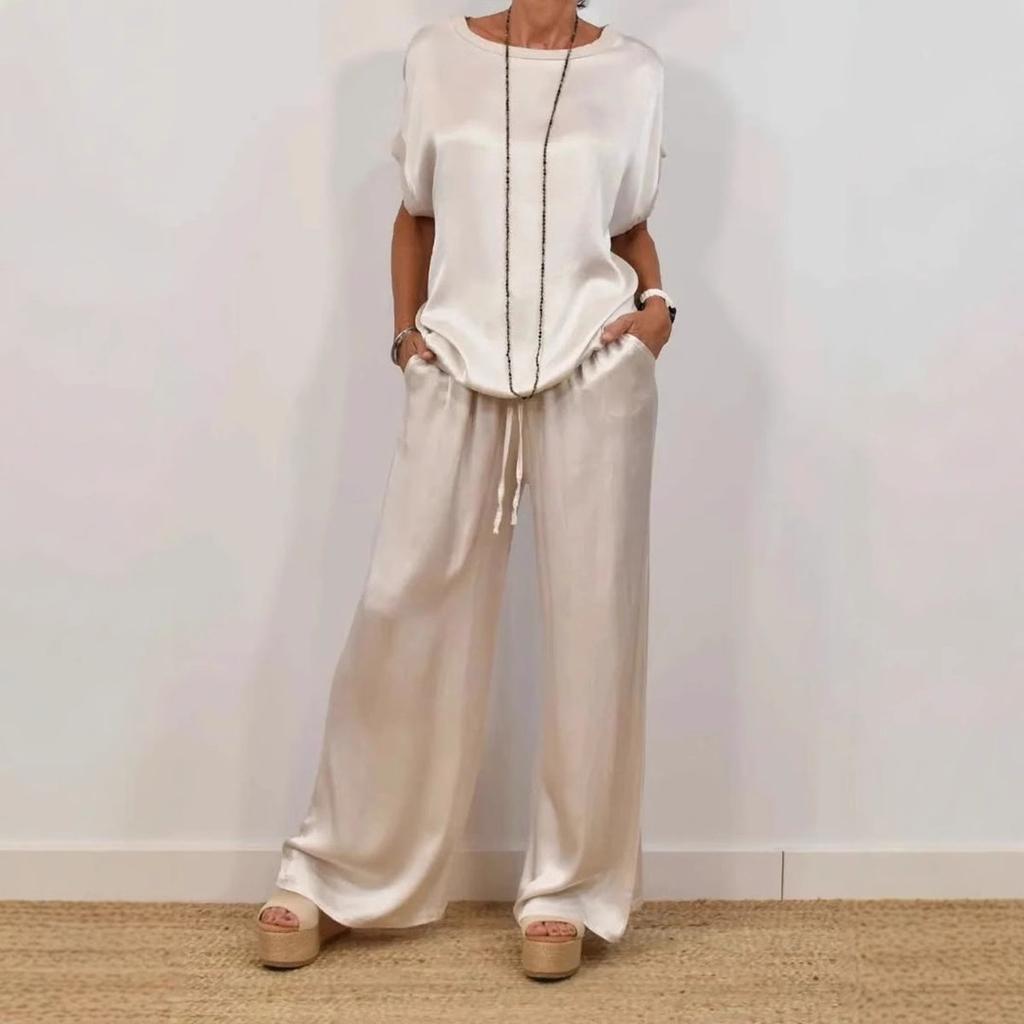 Women's two-piece satin set, loose-fitting T-shirt and wide-leg pants.